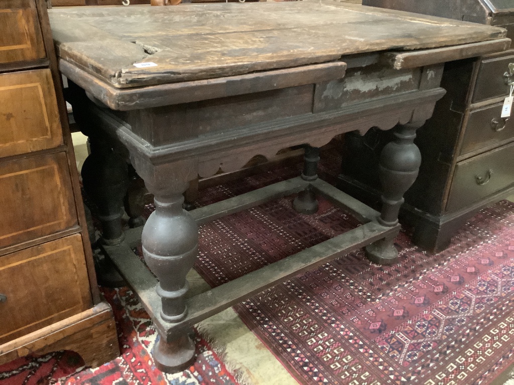 A 19th century Dutch oak extending refectory table, 212cm extended, width 76cm, height 81cm